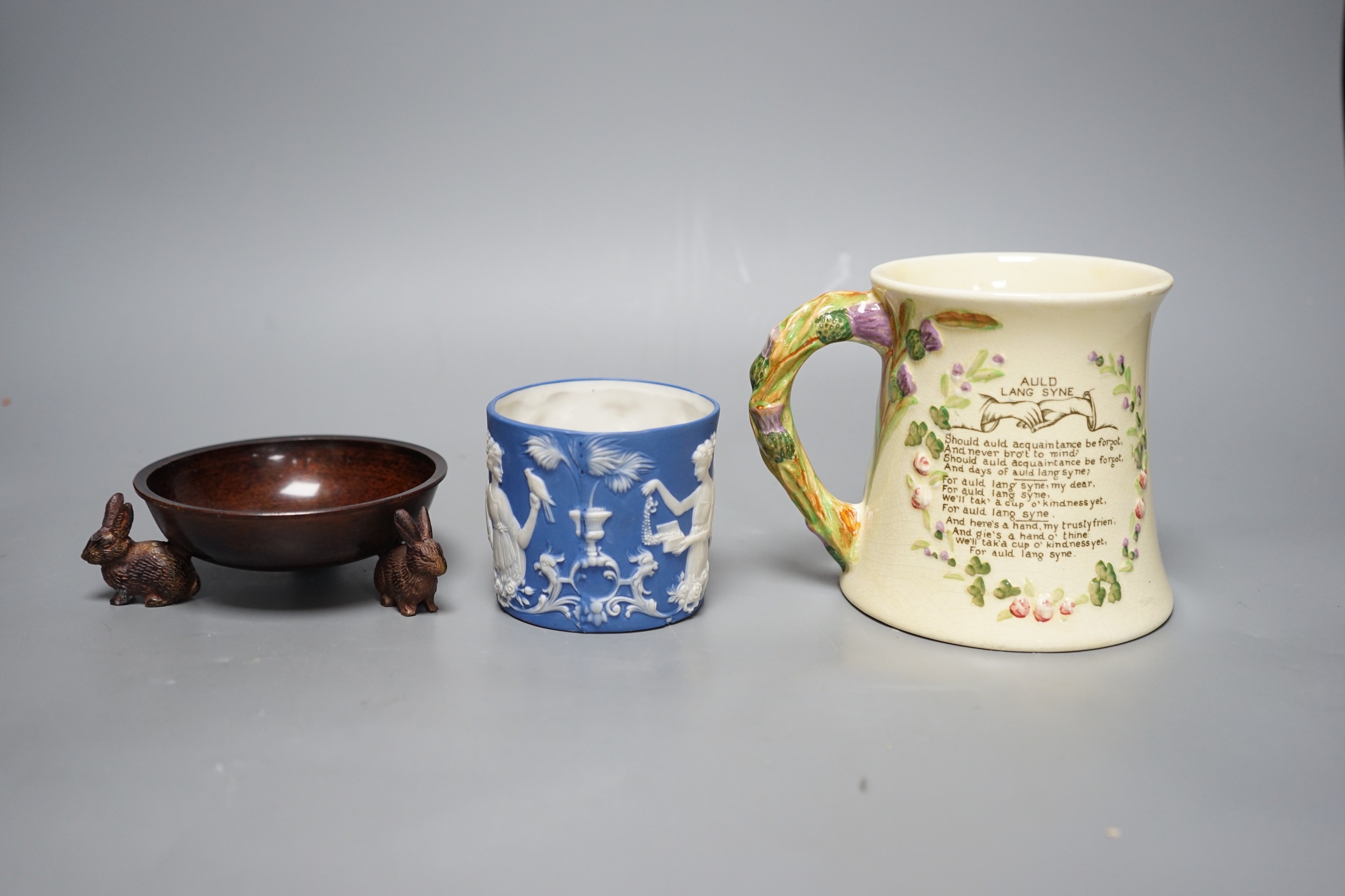A Crown Devon Fieldings musical mug, a bronze tripod dish and a jasper pot